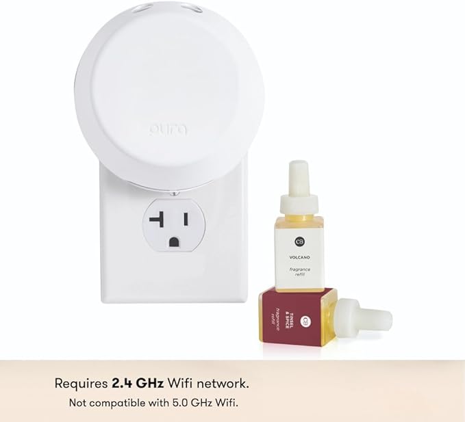 Capri Blue Volcano and Tinsel & Spice Pura 4 smart home diffuser kit with two holiday fragrance vials and modern diffuser