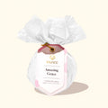 Bath balm with 'musee' branding and 'Amazing Grace' text on a light beige background