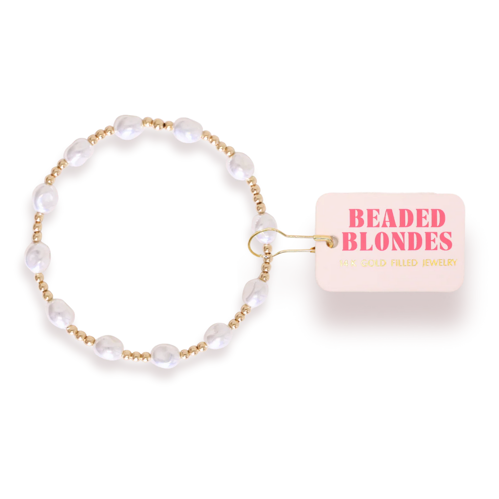Bri Pearl Bracelet in Gold with a 'Beaded Blondes' tag on a white background