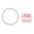 Bri Pearl Bracelet in Gold with a 'Beaded Blondes' tag on a white background