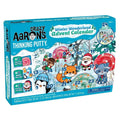 Crazy Aaron's Thinking Putty Winter Wonderland Advent Calendar box, featuring colorful cartoon illustrations of Santa Claus, a fox, a raccoon, and other holiday characters on a bright blue background.