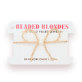 Gold beaded bow-shaped earrings on a 'Beaded Blondes' branded card.