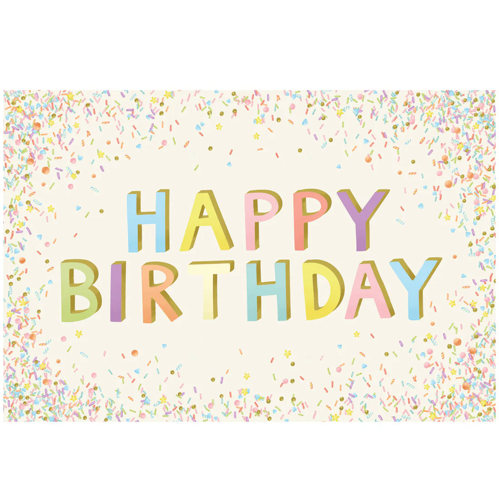 Colorful 'Happy Birthday' text on a confetti-patterned placemat