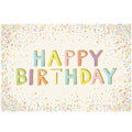 Colorful 'Happy Birthday' text on a confetti-patterned placemat