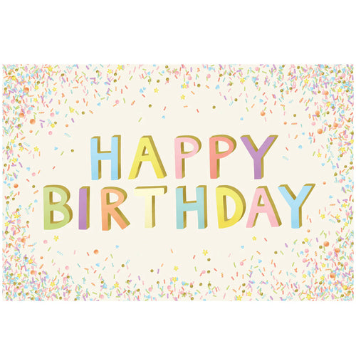 Colorful 'Happy Birthday' text on a confetti-patterned placemat