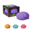 Purple dog-shaped Nee doh  with packaging and additional dog toys in different colors on a white background