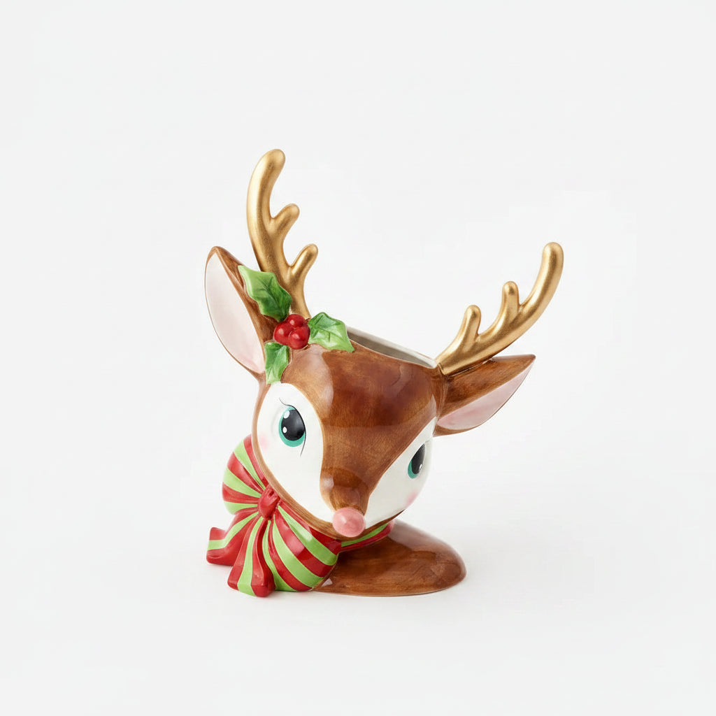 Two ceramic Christmas deer figurines with gold antlers, green holly accents, and red-and-green striped scarves, shown on a clean white background.