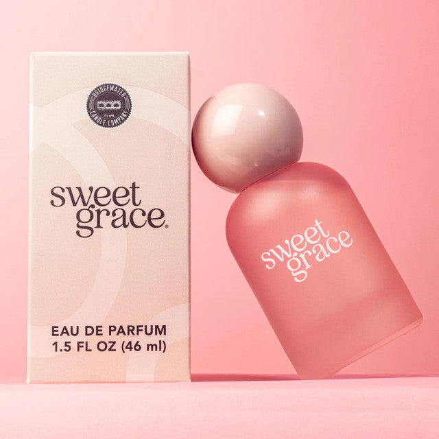 Sweet Grace Eau de Parfum in a frosted pink bottle with glossy pink ball top luxury boutique perfume 1.5 oz.
