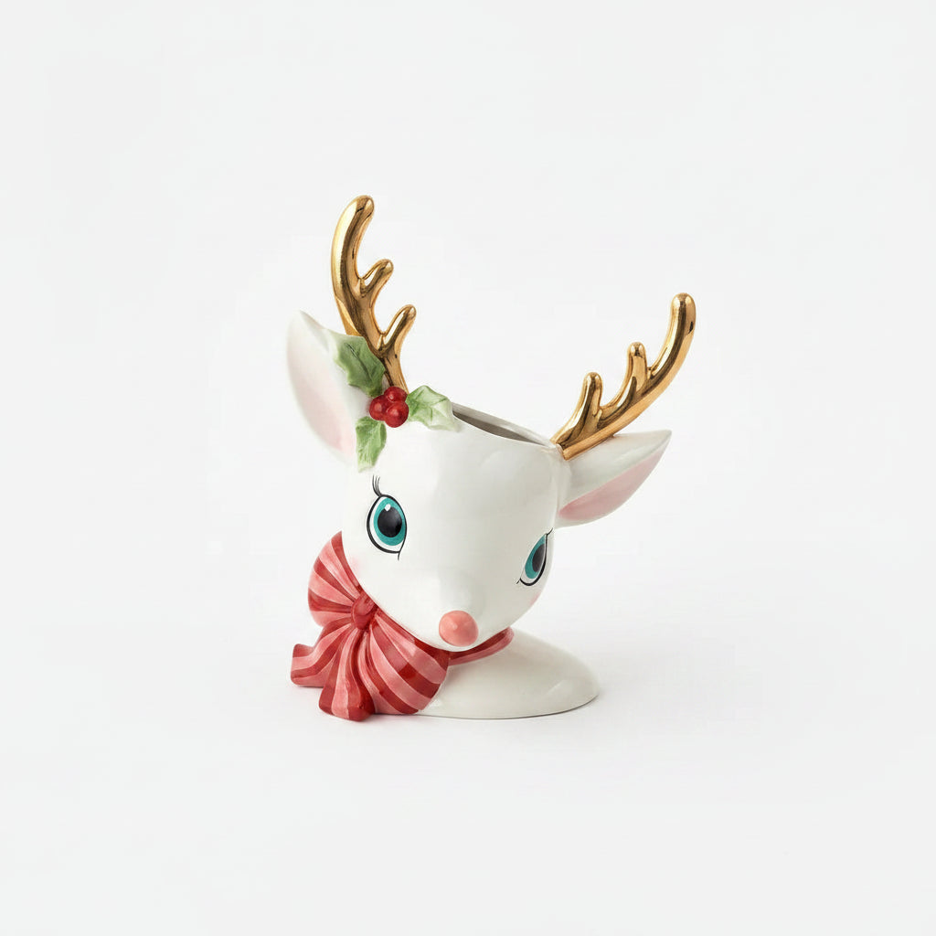 Two ceramic Christmas deer figurines with gold antlers, green holly accents, and red-and-green striped scarves, shown on a clean white background.