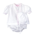 White heirloom baby diaper set with shadow stitch lamb embroidery, pink trim, matching bloomers, and bonnet
