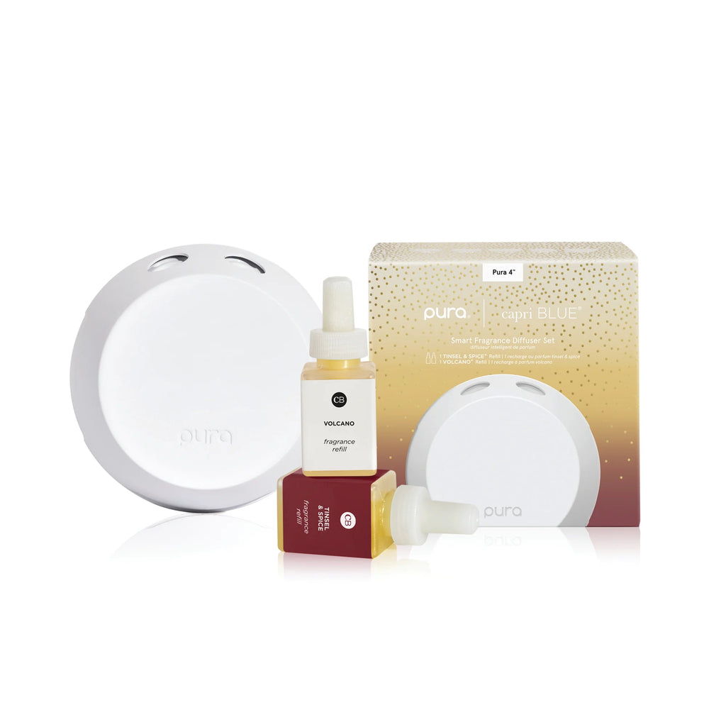 Capri Blue Volcano and Tinsel & Spice Pura 4 smart home diffuser kit with two holiday fragrance vials and modern diffuser