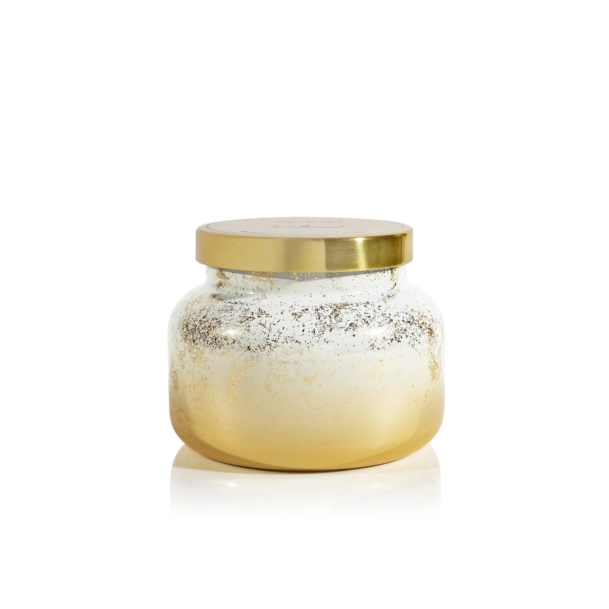Capri Blue Volcano Glimmer signature candle in white ombré glass with gold accents and tropical citrus fragrance